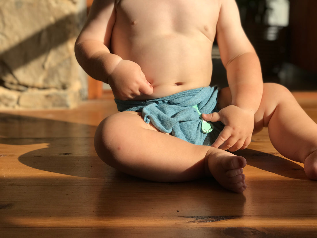 Cute baby in modern Pokkelokkie cloth nappy 